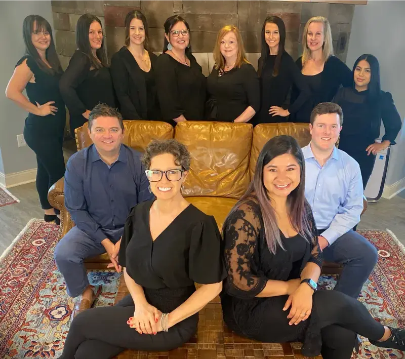 Dental practice team portrait showing staff members posing together in Columbia, TN office.